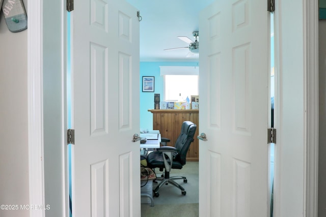office area featuring ceiling fan and carpet floors