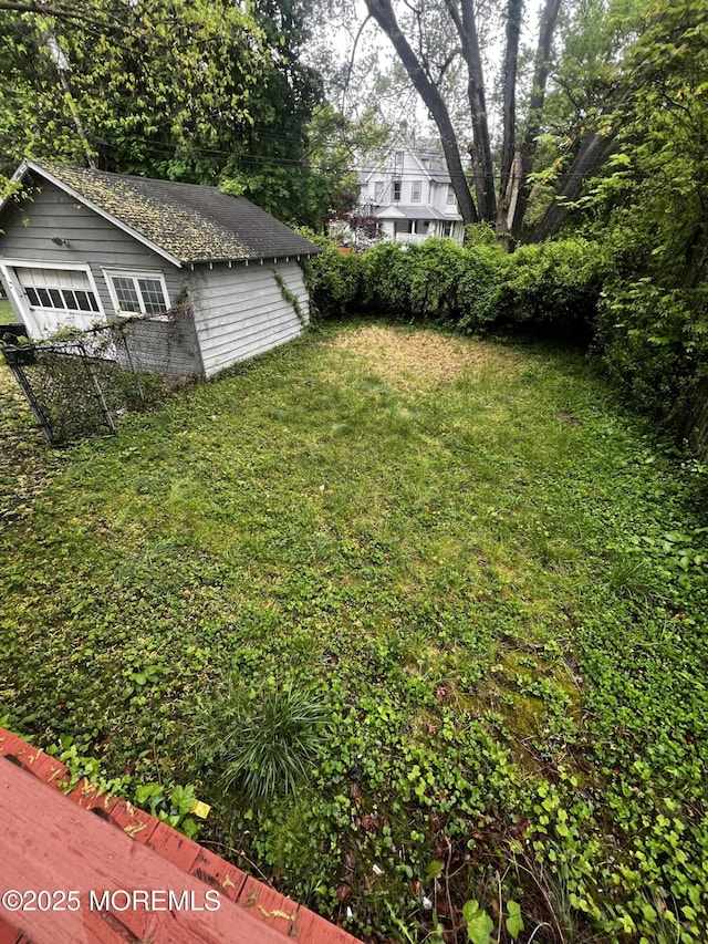 view of yard with a garage