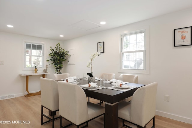dining space featuring a wealth of natural light, visible vents, light wood-style flooring, and recessed lighting