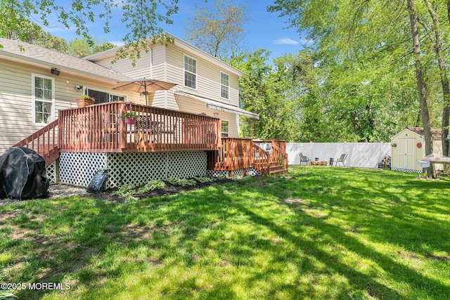 2015 Red Cedar St, Toms River, NJ 08753 - back of property with a storage shed, an outdoor structure, and a deck
