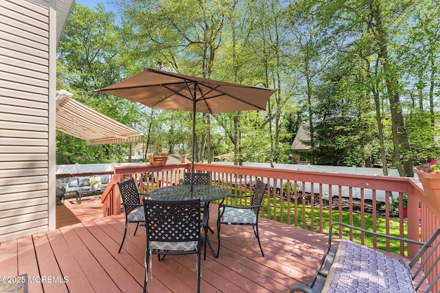 2015 Red Cedar St, Toms River, NJ 08753 - wooden terrace featuring outdoor dining space and view of wooded area
