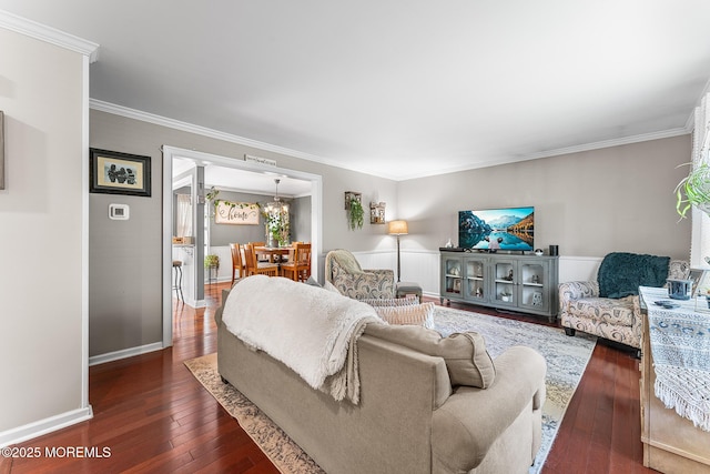 2015 Red Cedar St, Toms River, NJ 08753 - living room featuring dark wood-type flooring, crown molding, baseboards, and a chandelier