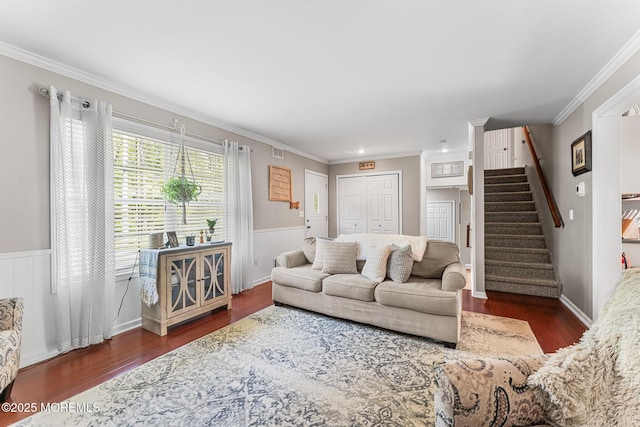 2015 Red Cedar St, Toms River, NJ 08753 - living room featuring crown molding, wood finished floors, stairs, and a wainscoted wall