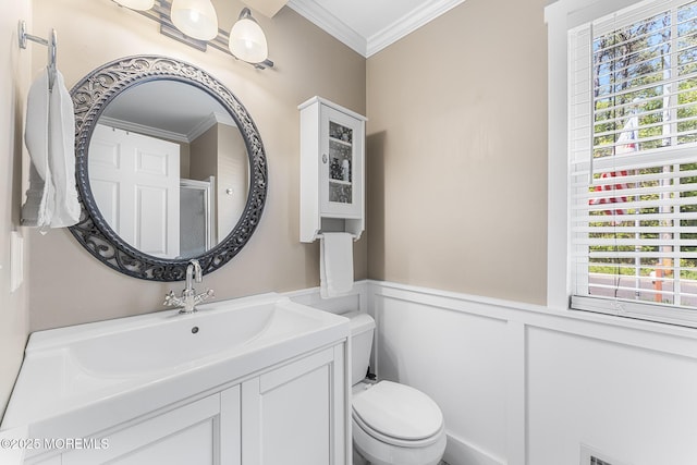 2015 Red Cedar St, Toms River, NJ 08753 - bathroom with toilet, ornamental molding, a wainscoted wall, vanity, and a decorative wall