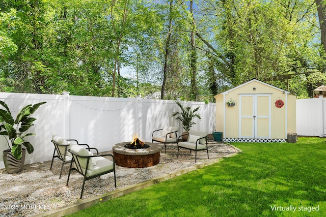 2015 Red Cedar St, Toms River, NJ 08753 - view of yard with an outdoor fire pit, a shed, an outdoor structure, and a patio
