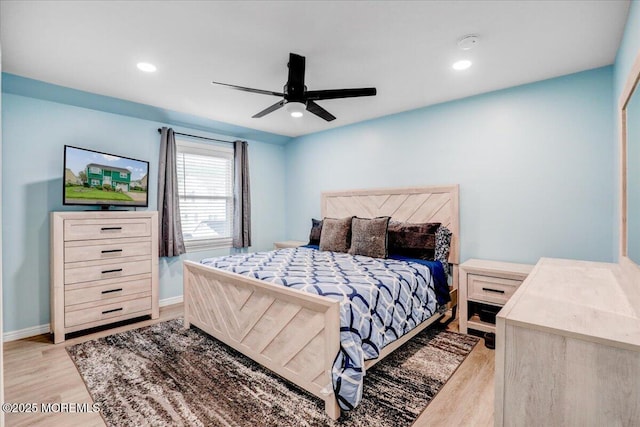 bedroom featuring baseboards, light wood-style floors, recessed lighting, and a ceiling fan