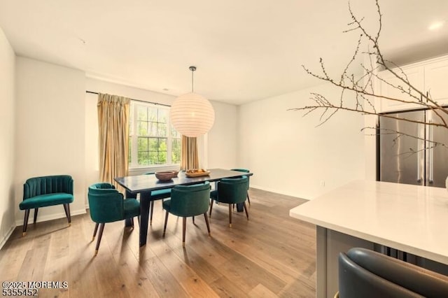 2206 Evans Ln, Middletown, NJ 07748 - dining space with baseboards and light wood-type flooring