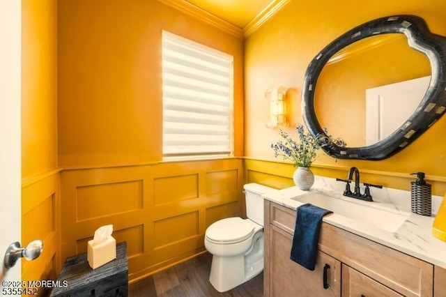 2206 Evans Ln, Middletown, NJ 07748 - half bathroom featuring toilet, a decorative wall, crown molding, and wood finished floors