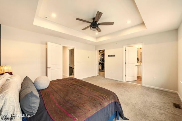 2206 Evans Ln, Middletown, NJ 07748 - carpeted bedroom with a ceiling fan, a tray ceiling, visible vents, baseboards, and recessed lighting
