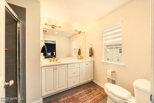 2206 Evans Ln, Middletown, NJ 07748 - full bathroom featuring toilet, baseboards, visible vents, and a sink