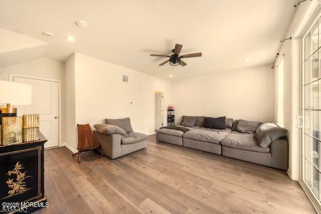 2206 Evans Ln, Middletown, NJ 07748 - living room with a ceiling fan, light wood-type flooring, plenty of natural light, and visible vents