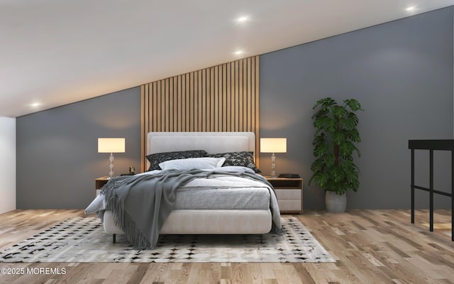 bedroom with wood finished floors and recessed lighting