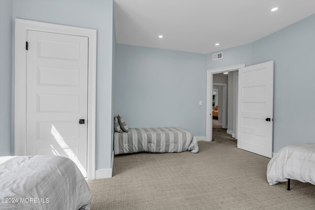 bedroom featuring recessed lighting, visible vents, baseboards, and carpet floors