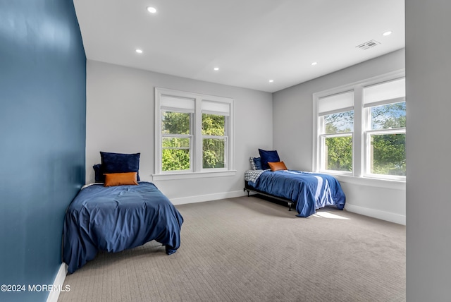 bedroom featuring carpet, baseboards, visible vents, and recessed lighting