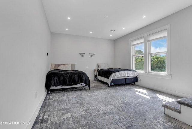 bedroom featuring visible vents and recessed lighting