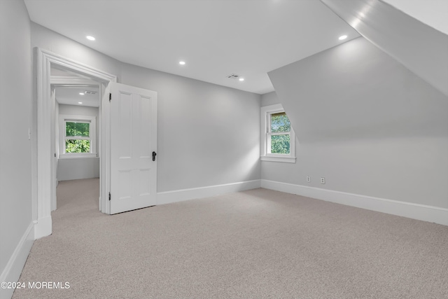 interior space featuring baseboards, a healthy amount of sunlight, and recessed lighting