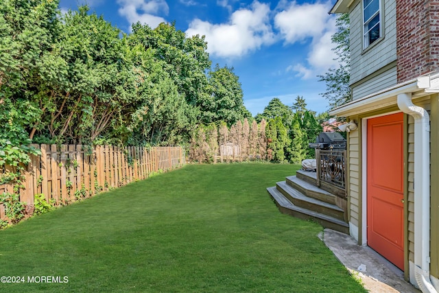 view of yard featuring fence