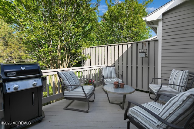 deck featuring grilling area