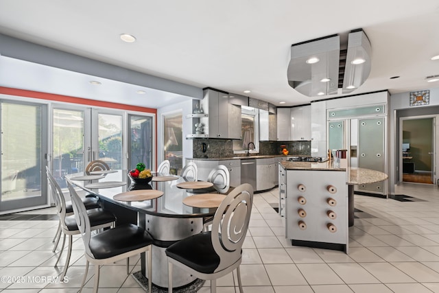 19 Dartmoor Dr, Manalapan, NJ 07726 - dining area with light tile patterned floors, recessed lighting, and french doors