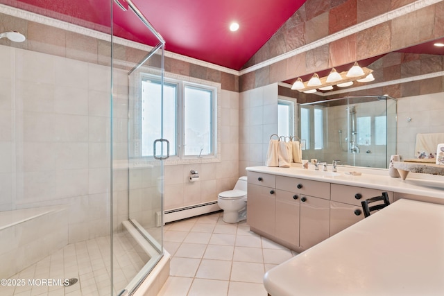 19 Dartmoor Dr, Manalapan, NJ 07726 - full bath featuring a baseboard radiator, lofted ceiling, vanity, tile walls, and a shower stall