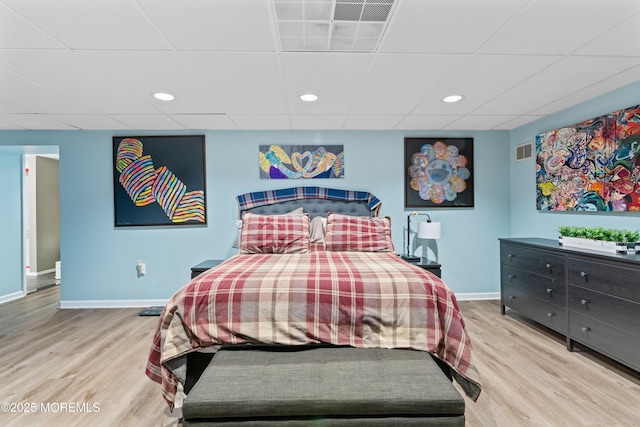 19 Dartmoor Dr, Manalapan, NJ 07726 - bedroom featuring wood finished floors, baseboards, and a paneled ceiling