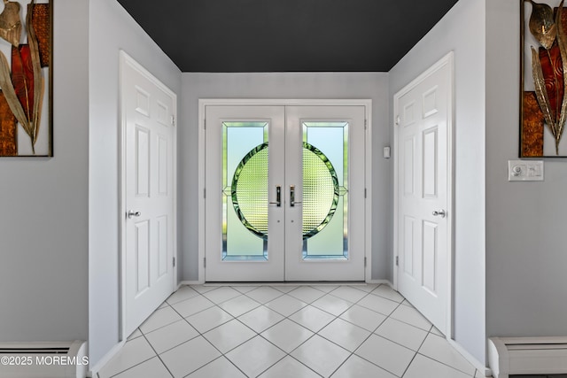19 Dartmoor Dr, Manalapan, NJ 07726 - entrance foyer featuring french doors, a baseboard heating unit, baseboards, and light tile patterned floors