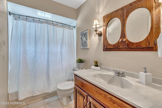 full bath featuring tile patterned flooring, toilet, and vanity