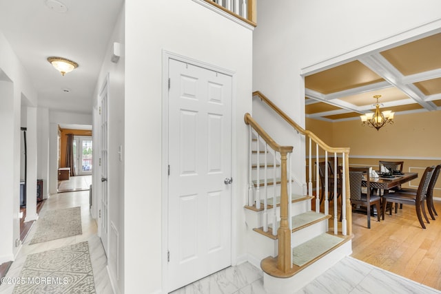 1 Skylark Dr, Jackson, NJ 08527 - foyer entrance featuring stairway, a chandelier, coffered ceiling, and beam ceiling