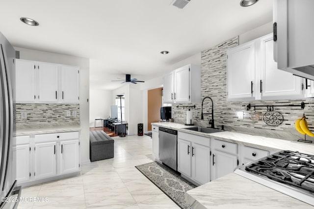 1 Skylark Dr, Jackson, NJ 08527 - kitchen with stainless steel appliances, tasteful backsplash, white cabinetry, a ceiling fan, and recessed lighting