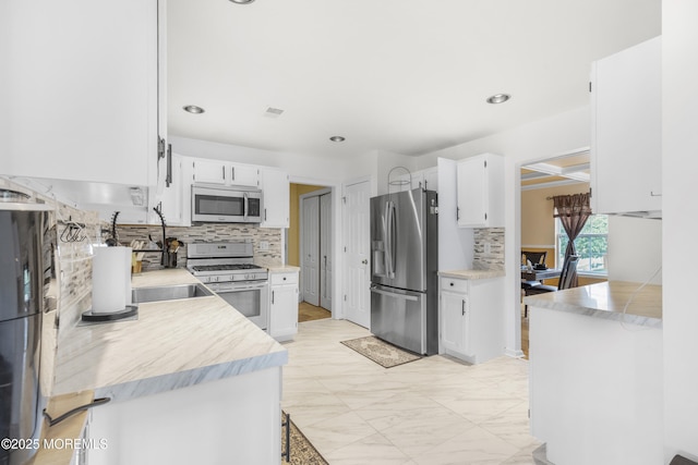 1 Skylark Dr, Jackson, NJ 08527 - kitchen featuring stainless steel appliances, tasteful backsplash, white cabinets, light countertops, and recessed lighting