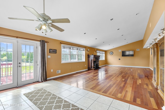 1 Skylark Dr, Jackson, NJ 08527 - unfurnished living room with french doors, vaulted ceiling, light tile patterned floors, and a ceiling fan