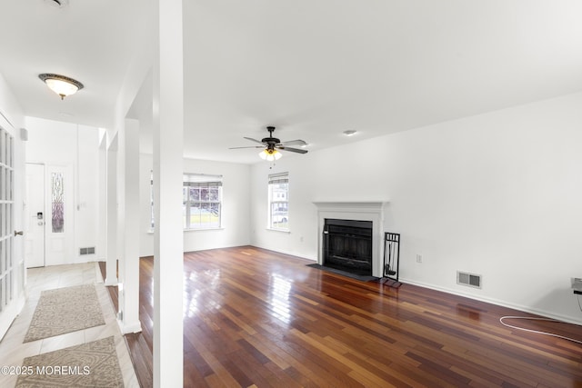1 Skylark Dr, Jackson, NJ 08527 - unfurnished living room featuring hardwood / wood-style flooring, a fireplace with flush hearth, and ceiling fan