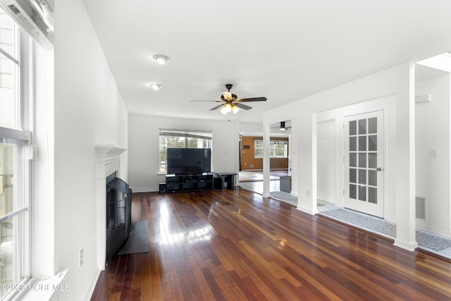 1 Skylark Dr, Jackson, NJ 08527 - living room featuring wood-type flooring, ceiling fan, and a fireplace with raised hearth