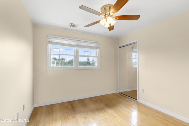 1 Skylark Dr, Jackson, NJ 08527 - unfurnished bedroom with light wood finished floors, a closet, and a ceiling fan