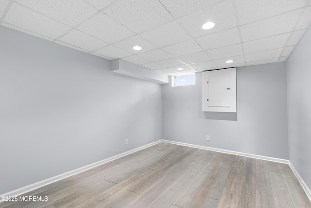 1 Skylark Dr, Jackson, NJ 08527 - below grade area featuring wood finished floors, recessed lighting, electric panel, and a paneled ceiling
