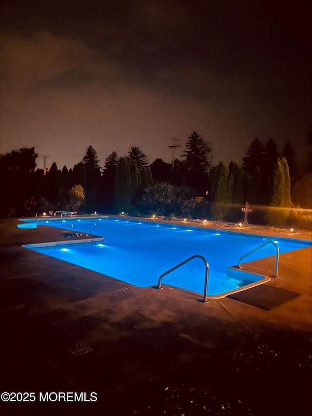 1 Skylark Dr, Jackson, NJ 08527 - pool at twilight featuring an outdoor pool and a patio