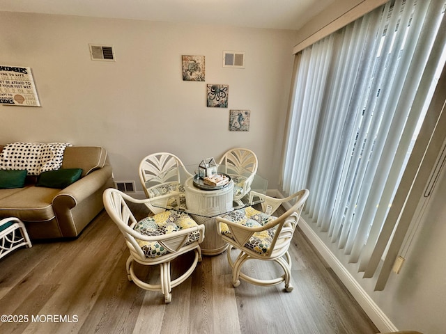 1709 N Rte 35 N Unit 12, Ortley Beach, NJ 08751 - dining area with baseboards, visible vents, and wood finished floors