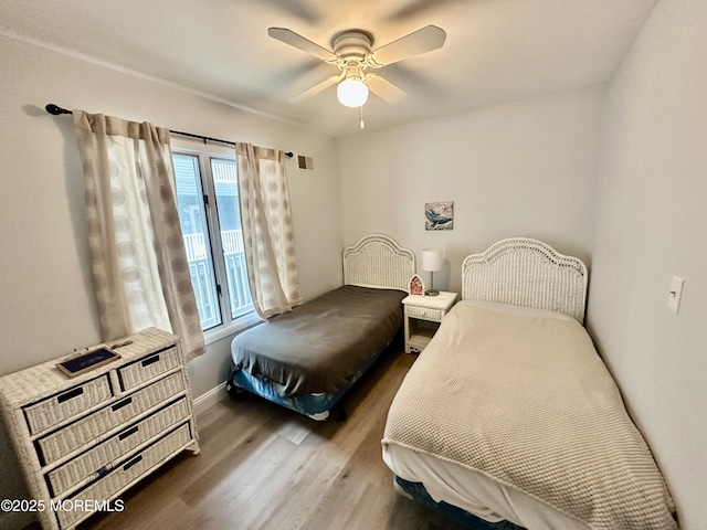 1709 N Rte 35 N Unit 12, Ortley Beach, NJ 08751 - bedroom with ceiling fan, baseboards, visible vents, and wood finished floors