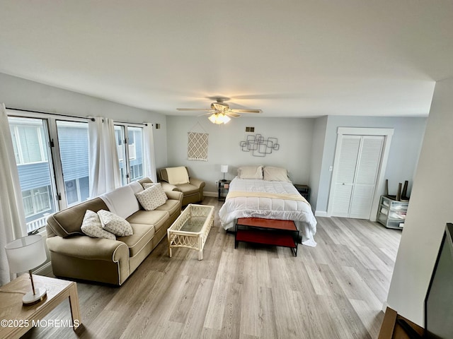 1709 N Rte 35 N Unit 12, Ortley Beach, NJ 08751 - bedroom featuring a ceiling fan, light wood-style floors, a closet, and baseboards