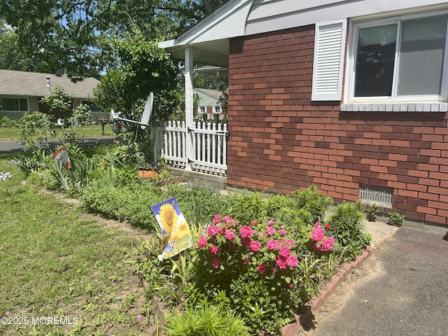 8 Lark St Unit A, Manchester, NJ 08759 - view of home's exterior with brick siding