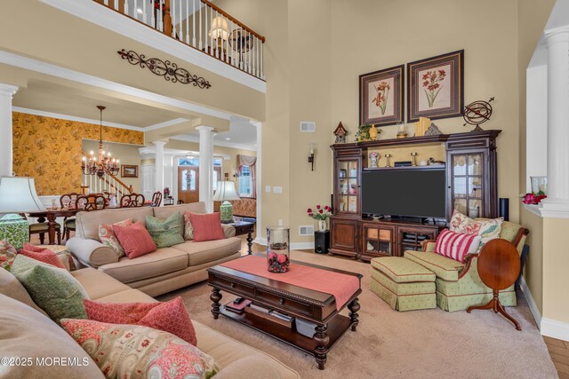 16 Millstone Way, Waretown, NJ 08758 - living area with decorative columns, baseboards, healthy amount of natural light, a towering ceiling, and crown molding