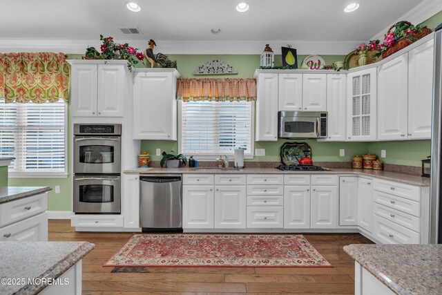 16 Millstone Way, Waretown, NJ 08758 - kitchen featuring stainless steel appliances, white cabinetry, a sink, hardwood / wood-style floors, and recessed lighting
