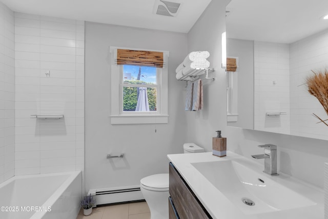 bathroom with a baseboard heating unit, tile patterned floors, vanity, and toilet