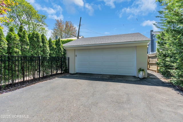 detached garage with fence