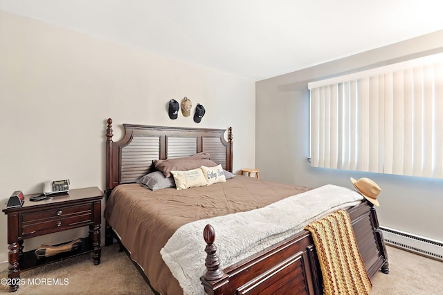 carpeted bedroom with baseboard heating