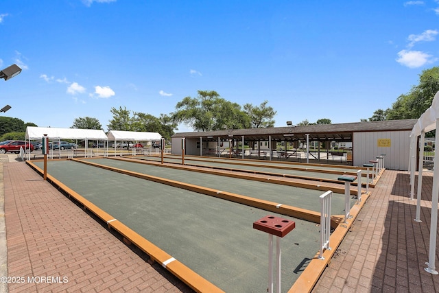 view of property's community featuring a game area