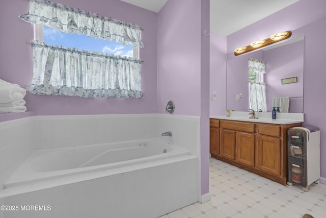 full bathroom with vanity, tile patterned floors, and a garden tub