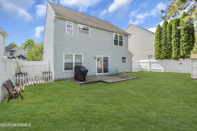 back of property with a deck