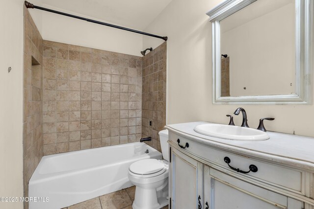 full bath featuring toilet, vanity, shower / bathtub combination, and tile patterned floors