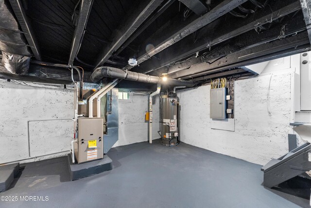 basement featuring water heater, electric panel, and heating unit